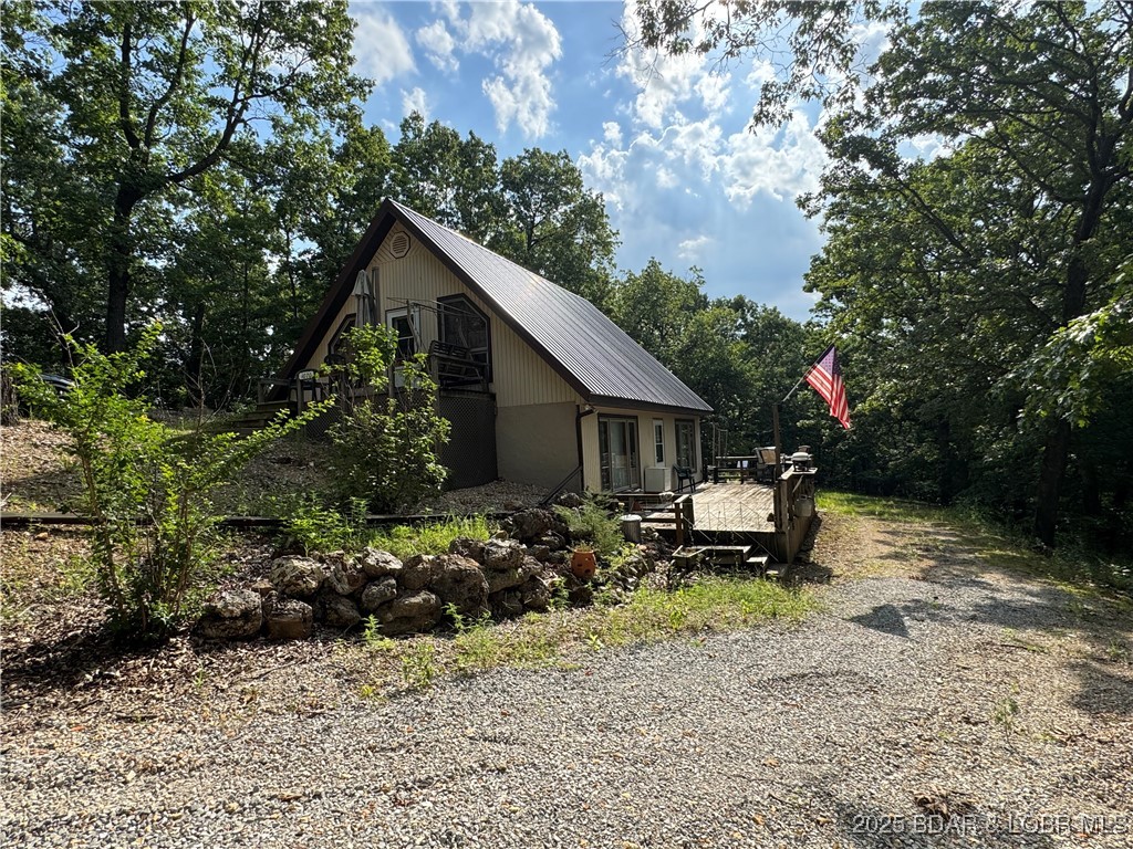 1070 Old Nonsuch Road Camdenton, MO 65020 - Photo 1 of 46 Cabin with 37 Acres!