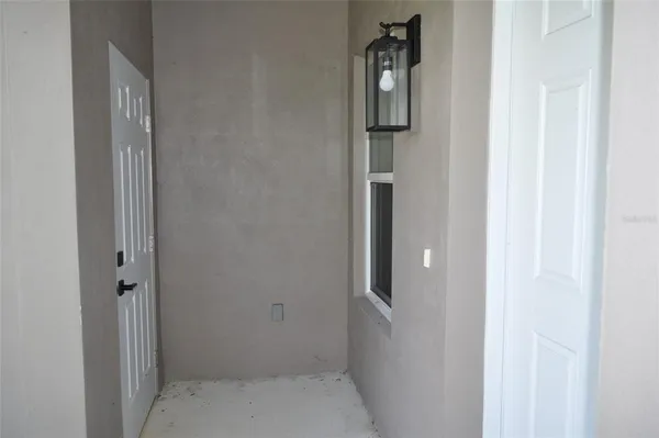 a bathroom with a glass door