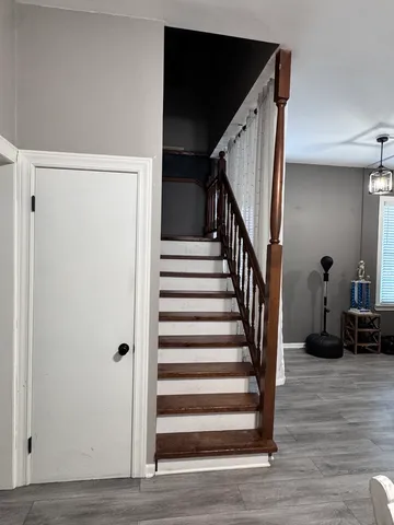 a view of entryway with wooden floor