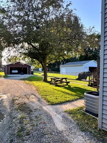 a view of a yard with a slide