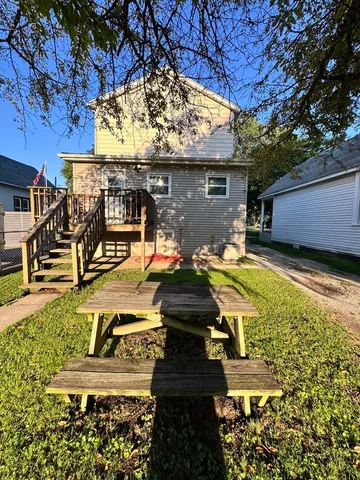 a view of a swimming pool with a yard