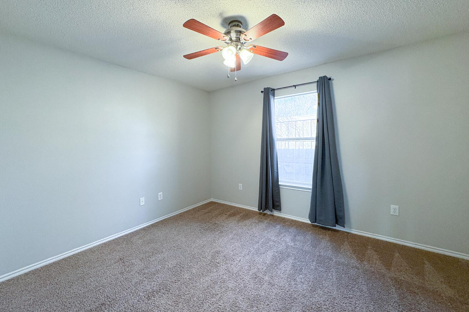 5822 90th Street Lubbock, TX 79424 - Photo 17 of 29 Second Bedroom
