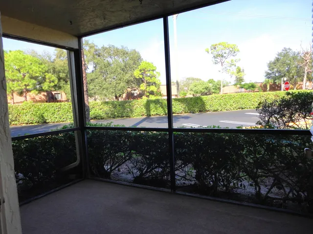 a view of a street from a balcony