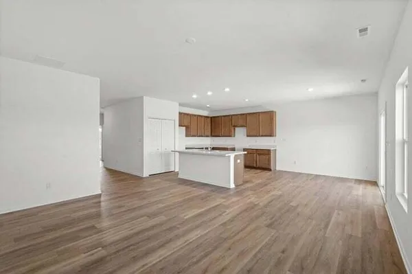 a view of kitchen with wooden floor