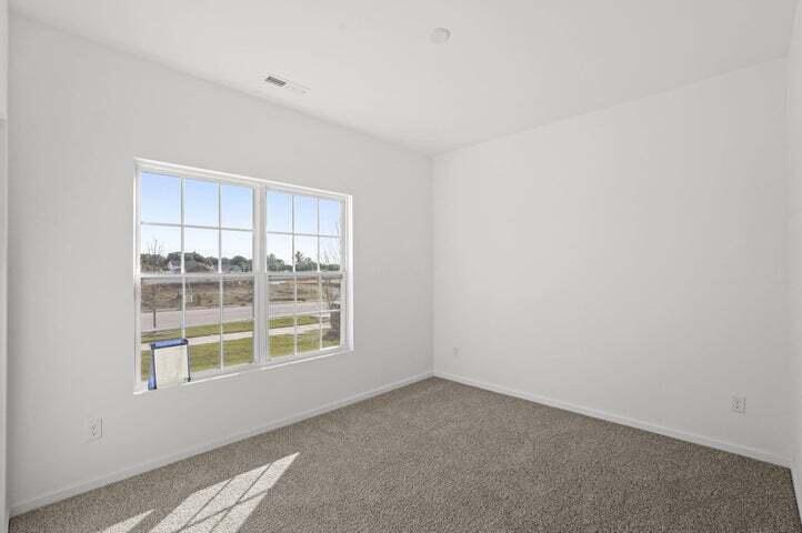 6641 East 103rd Avenue Crown Point, IN 46307 - Photo 5 of 11 an empty room with a window