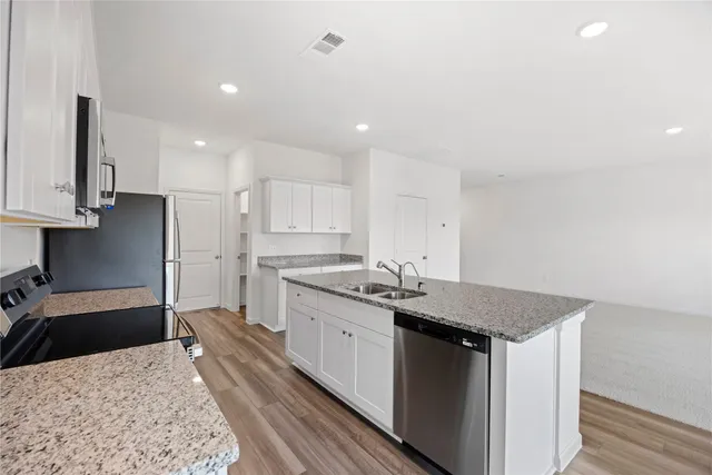 a view of an empty walk in closet