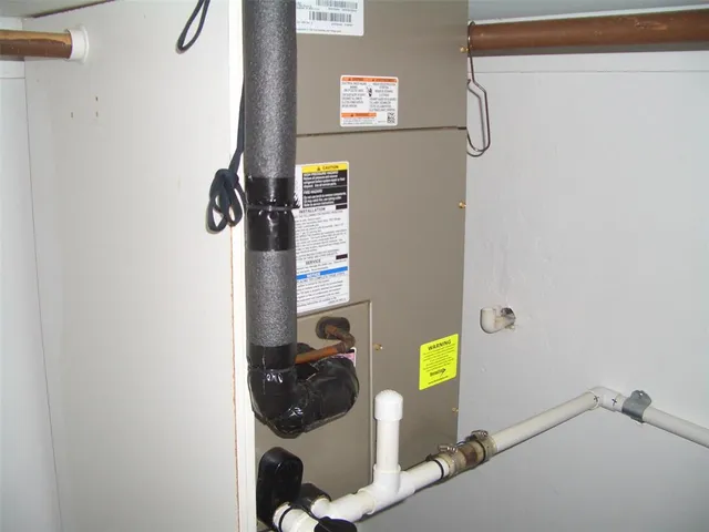 a view of storage and utility room with utility room