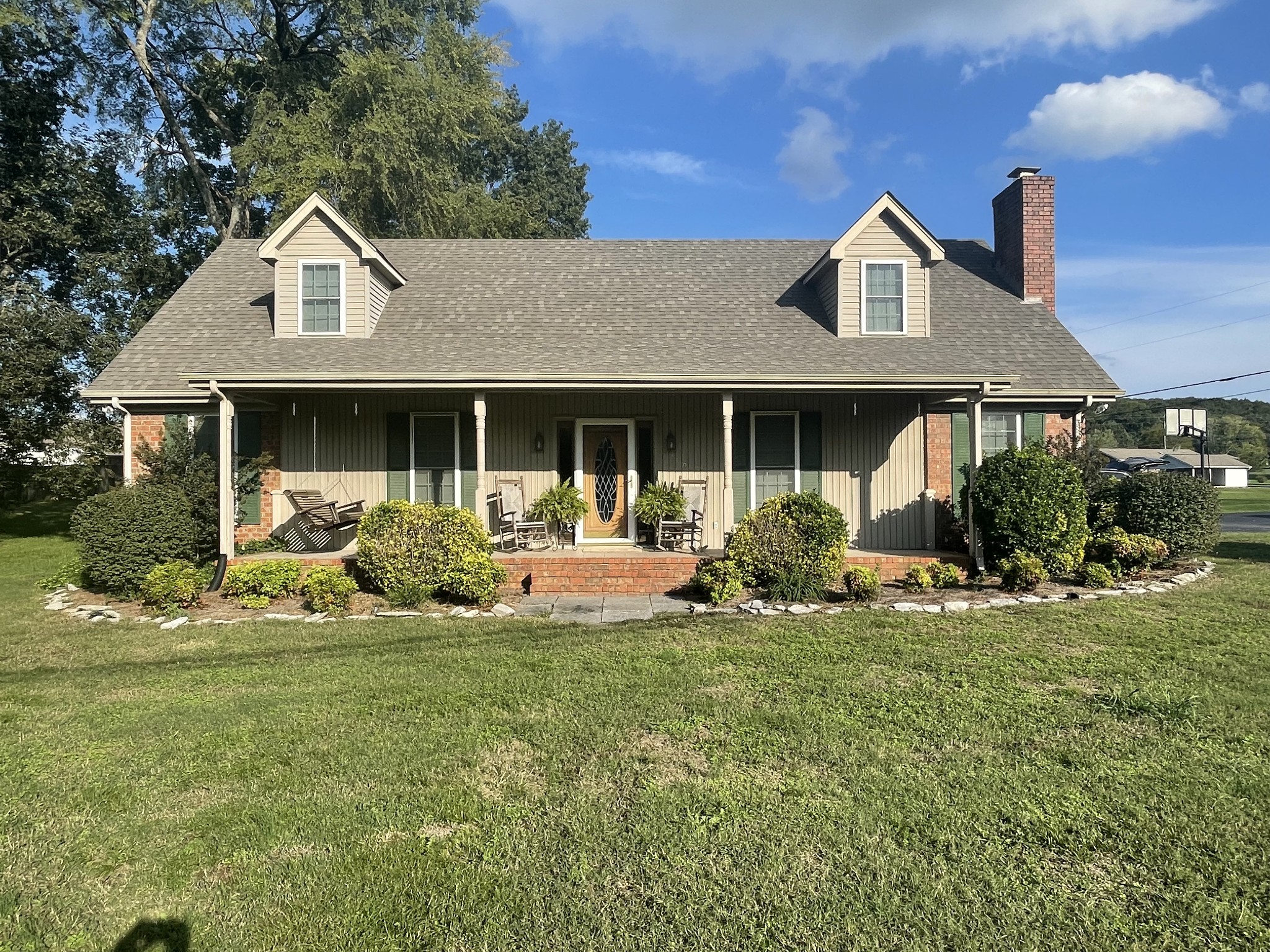 109 Walnut Grove Road Lebanon, TN 37090 - Photo 1 of 19 a front view of a house with a yard outdoor and seating