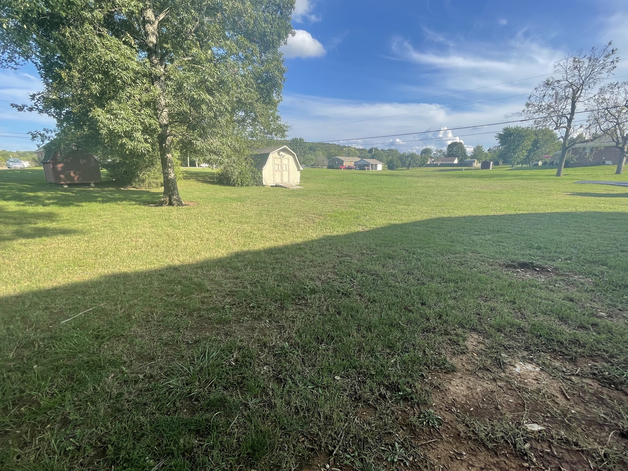 109 Walnut Grove Road Lebanon, TN 37090 - Photo 4 of 19 a view of a golf course with a lake