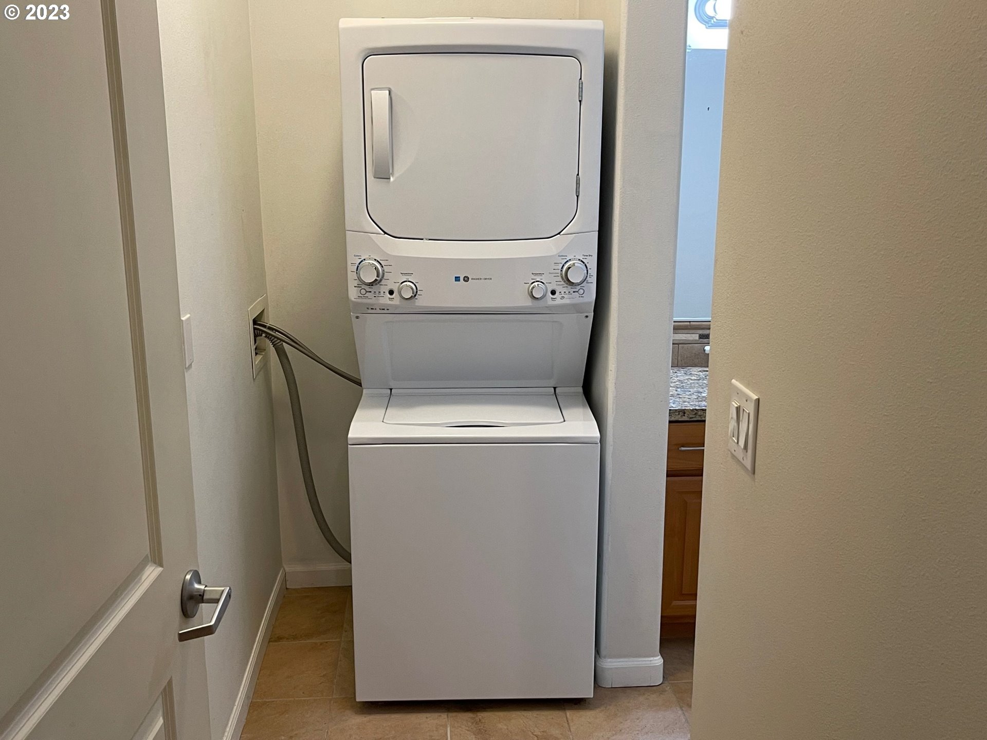 20512 Southwest Roy Rogers Road, Unit 112 Sherwood, OR 97140 - Photo 16 of 18 a utility room with dryer and washer