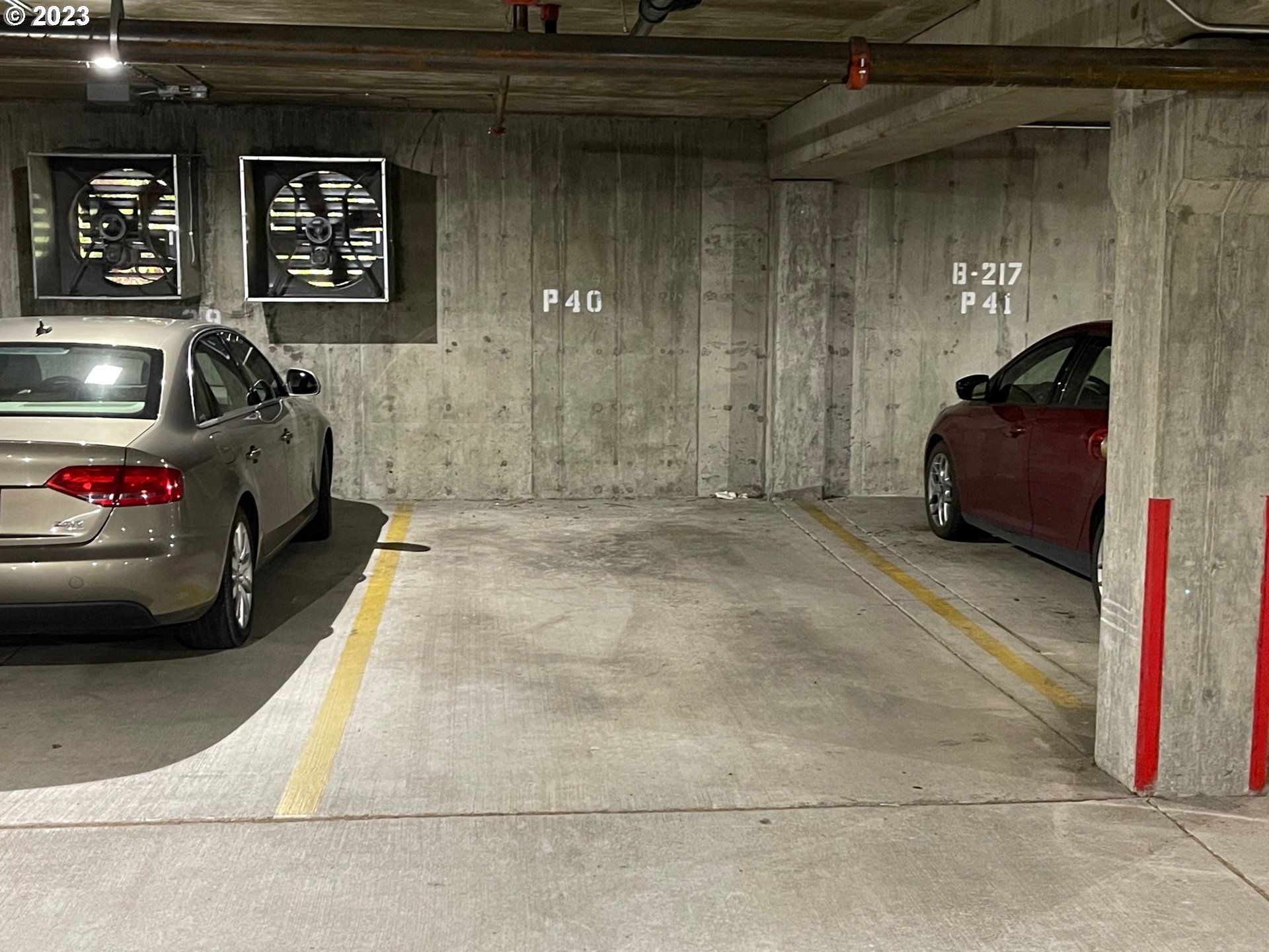 20512 Southwest Roy Rogers Road, Unit 112 Sherwood, OR 97140 - Photo 18 of 18 a car parked in parking garage