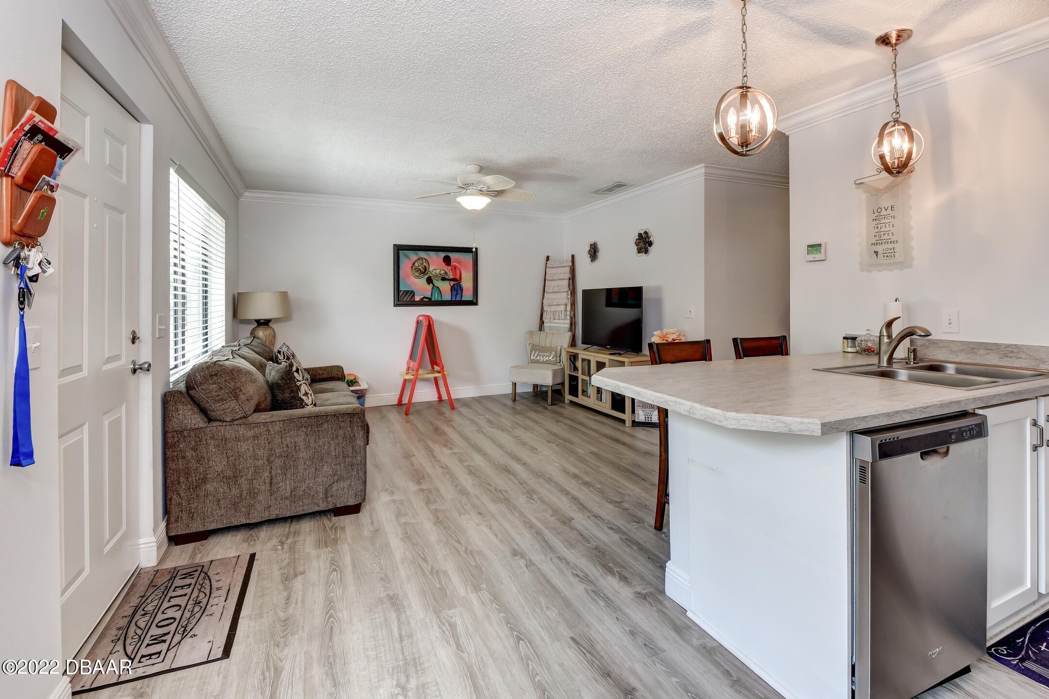 1601 Big Tree Road, Unit 905 South Daytona, FL 32119 - Photo 8 of 22 7-Kitchen-Living-Room
