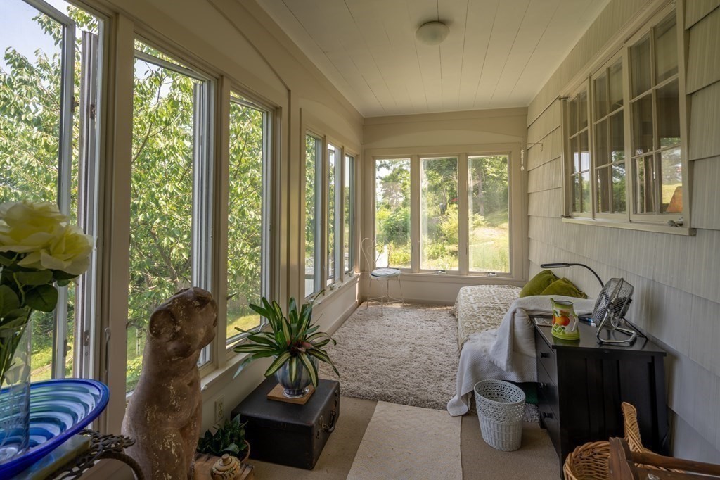 26 Park Road Monson, MA 01057 - Photo 5 of 32 a living room with furniture and floor to ceiling windows