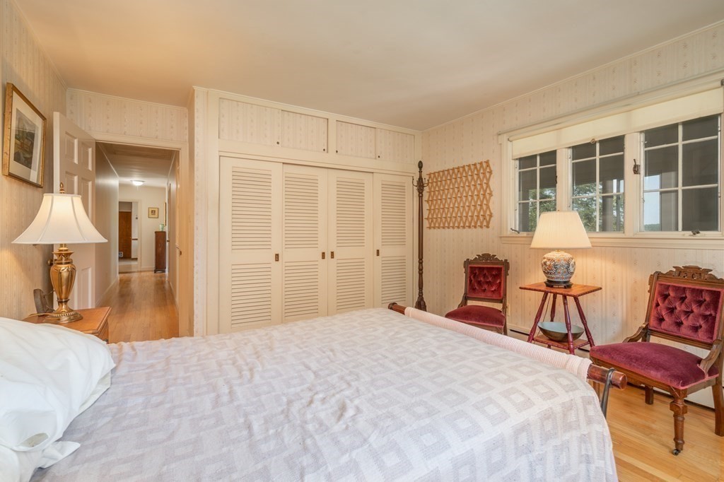 26 Park Road Monson, MA 01057 - Photo 10 of 32 a bedroom with a bed and a chair