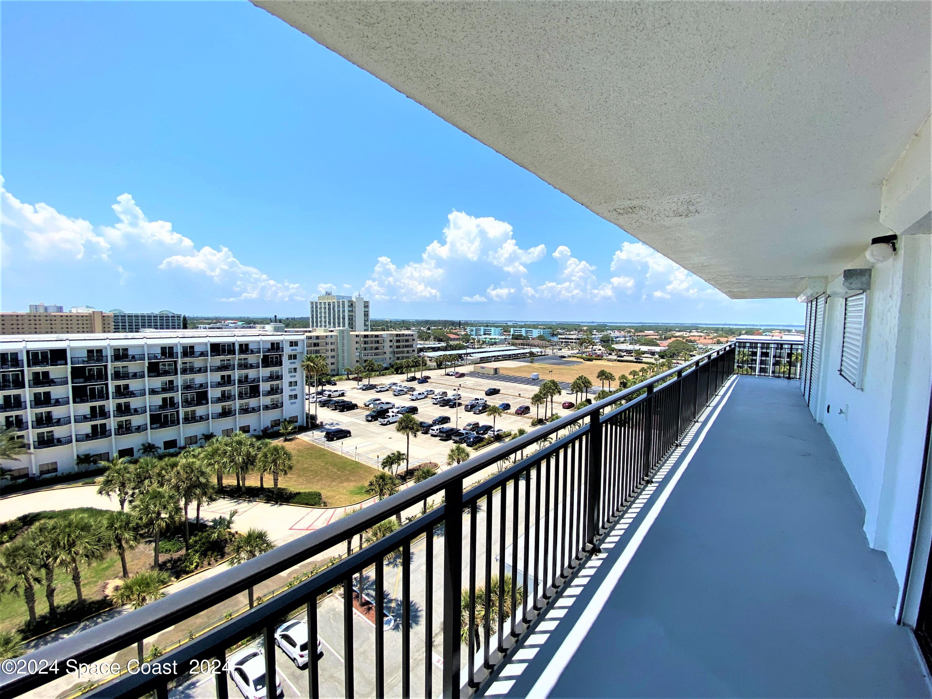 2100 North Atlantic Avenue, Unit 908 Cocoa Beach, FL 32931 - Photo 14 of 17 a view of a balcony