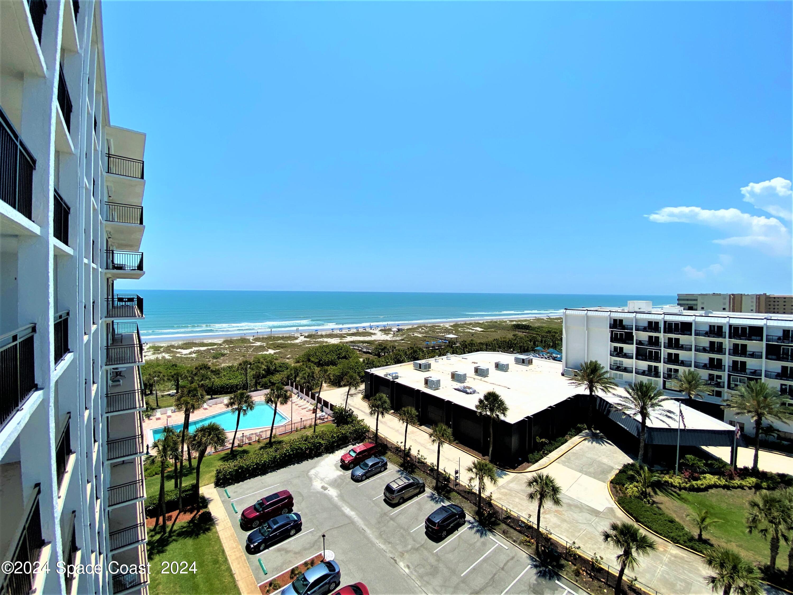 2100 North Atlantic Avenue, Unit 908 Cocoa Beach, FL 32931 - Photo 15 of 17 a view of a balcony with city view and lake view