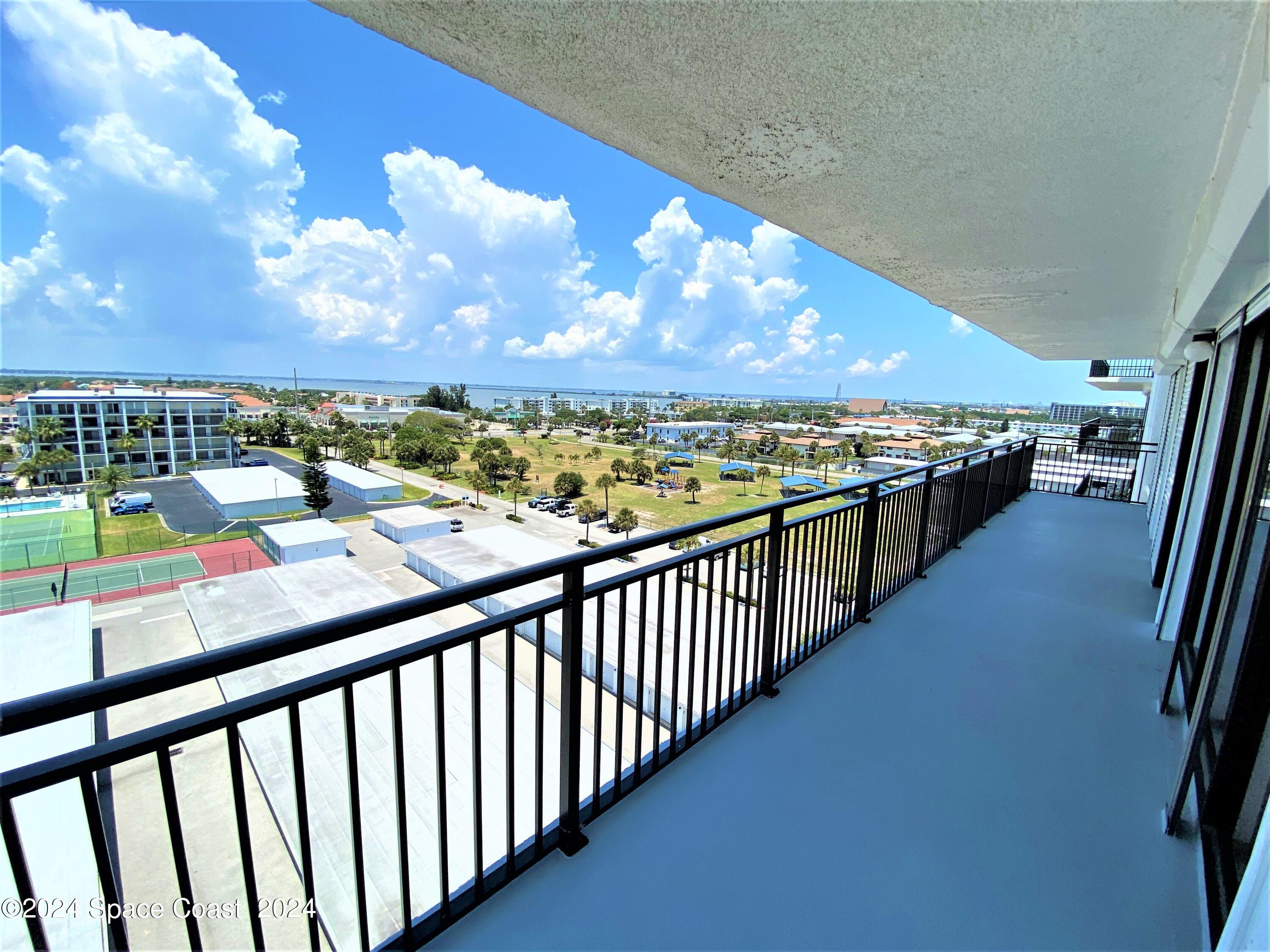 2100 North Atlantic Avenue, Unit 908 Cocoa Beach, FL 32931 - Photo 16 of 17 a view of city from a balcony