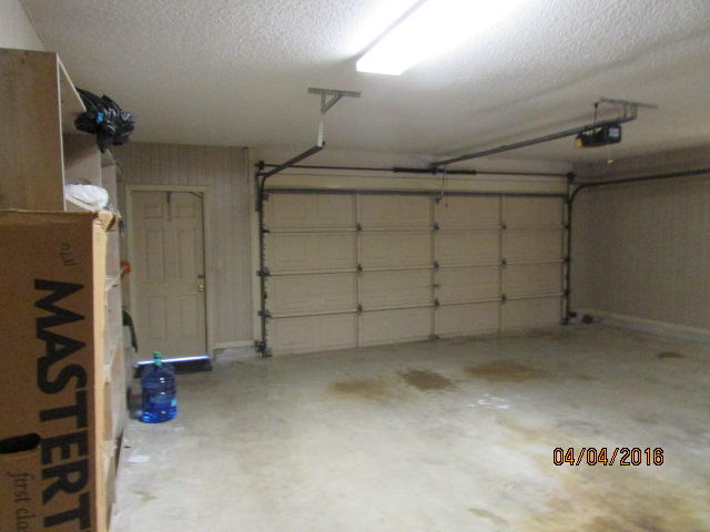 8720 Hidden Pines Road Fort Pierce, FL 34945 - Photo 21 of 31 21 garage