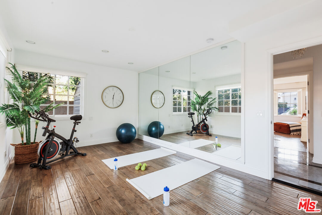 15475 Milldale Drive Los Angeles, CA 90077 - Photo 13 of 22 a view of a room with gym equipment
