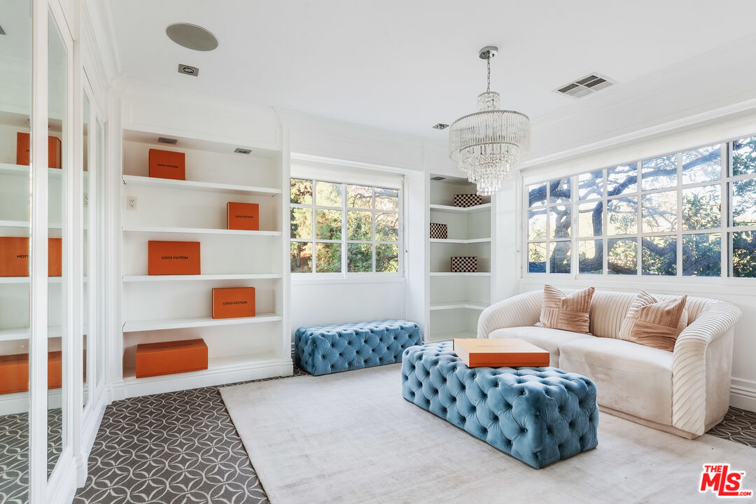 15475 Milldale Drive Los Angeles, CA 90077 - Photo 18 of 22 a living room with furniture and a window
