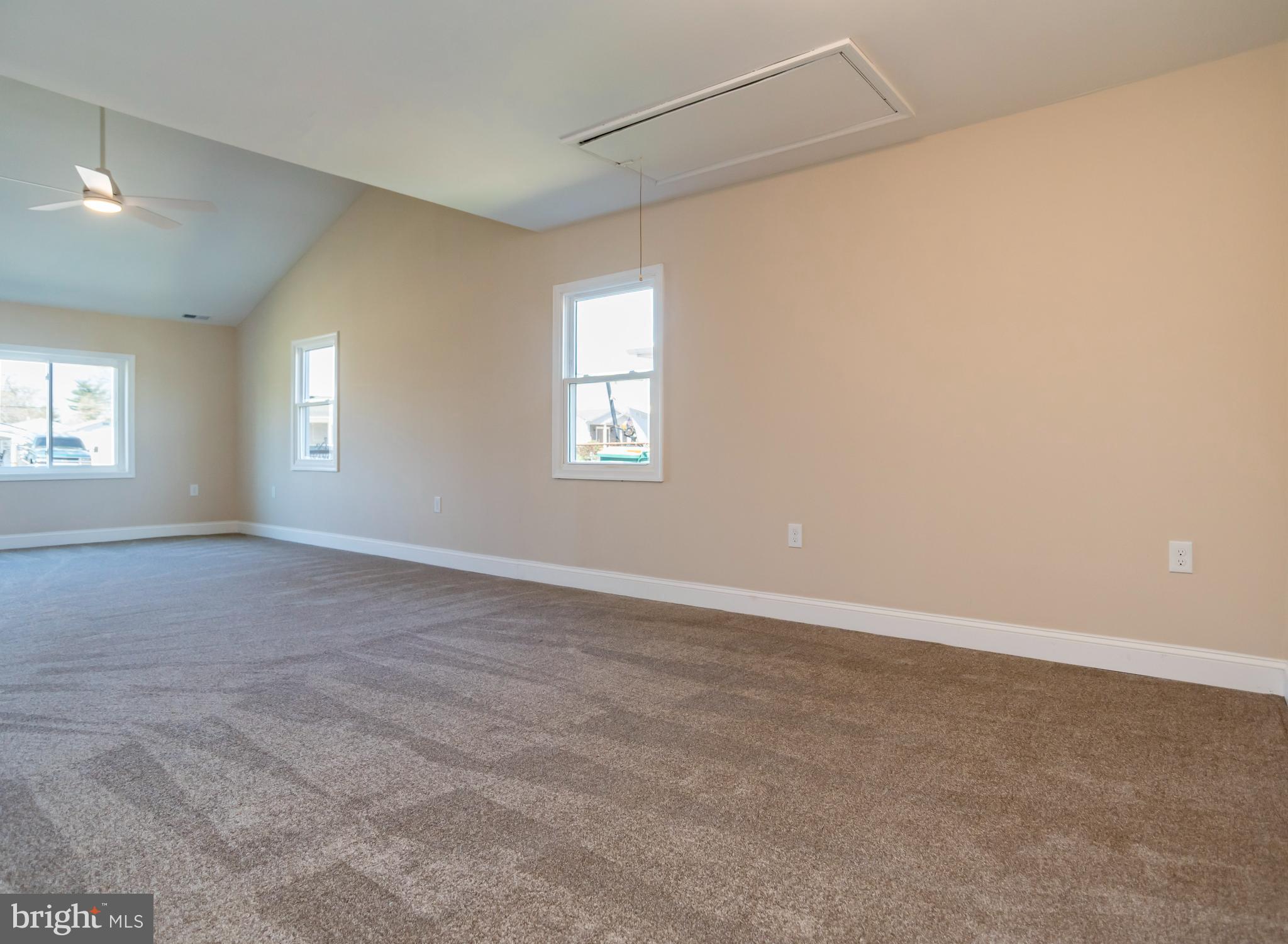 44 Elm Lane Levittown, PA 19054 - Photo 12 of 35 an empty room with windows and closet