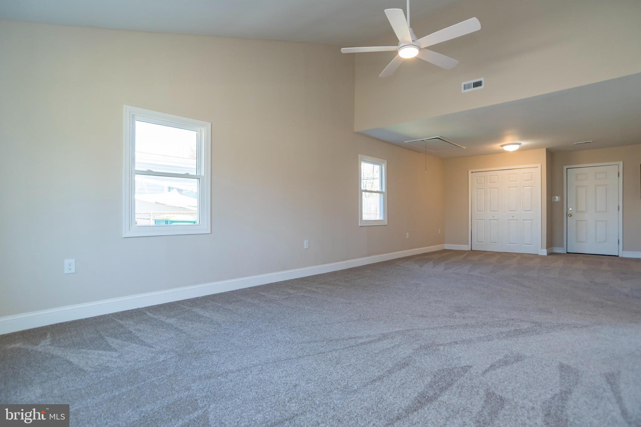 44 Elm Lane Levittown, PA 19054 - Photo 15 of 35 a view of an empty room with a window