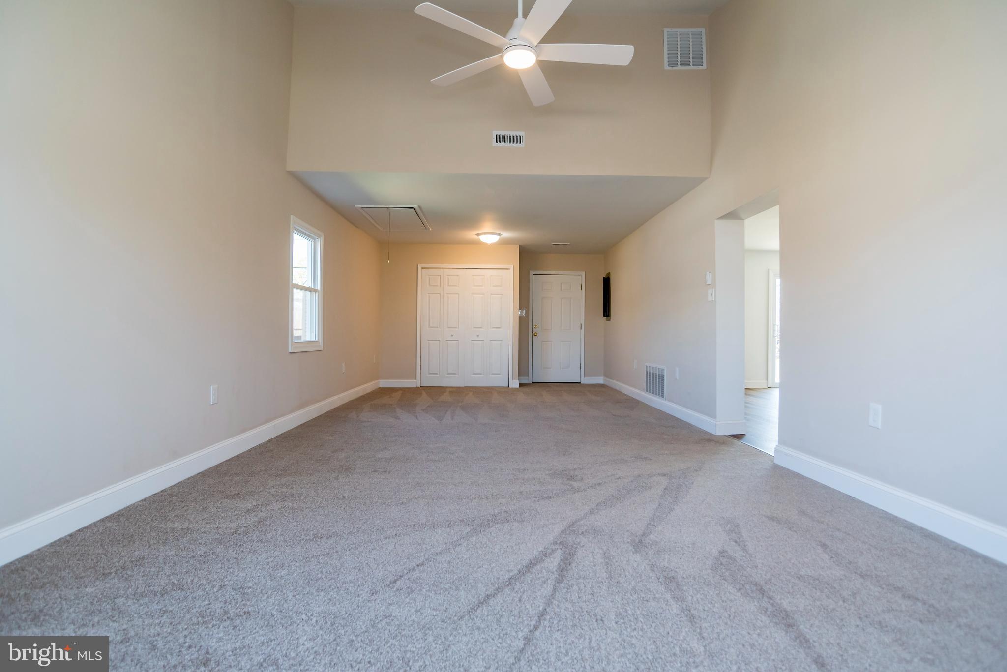 44 Elm Lane Levittown, PA 19054 - Photo 16 of 35 a view of an empty room with a window