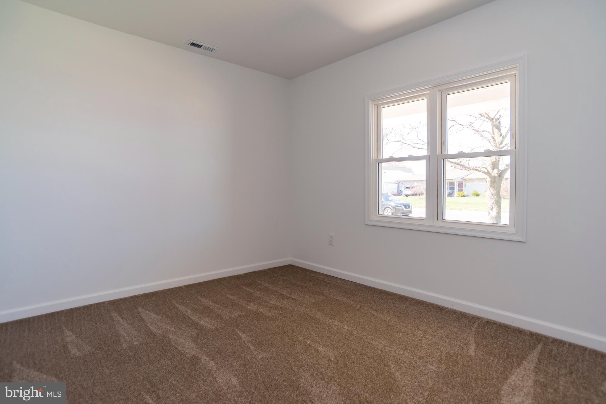44 Elm Lane Levittown, PA 19054 - Photo 18 of 35 an empty room with a window