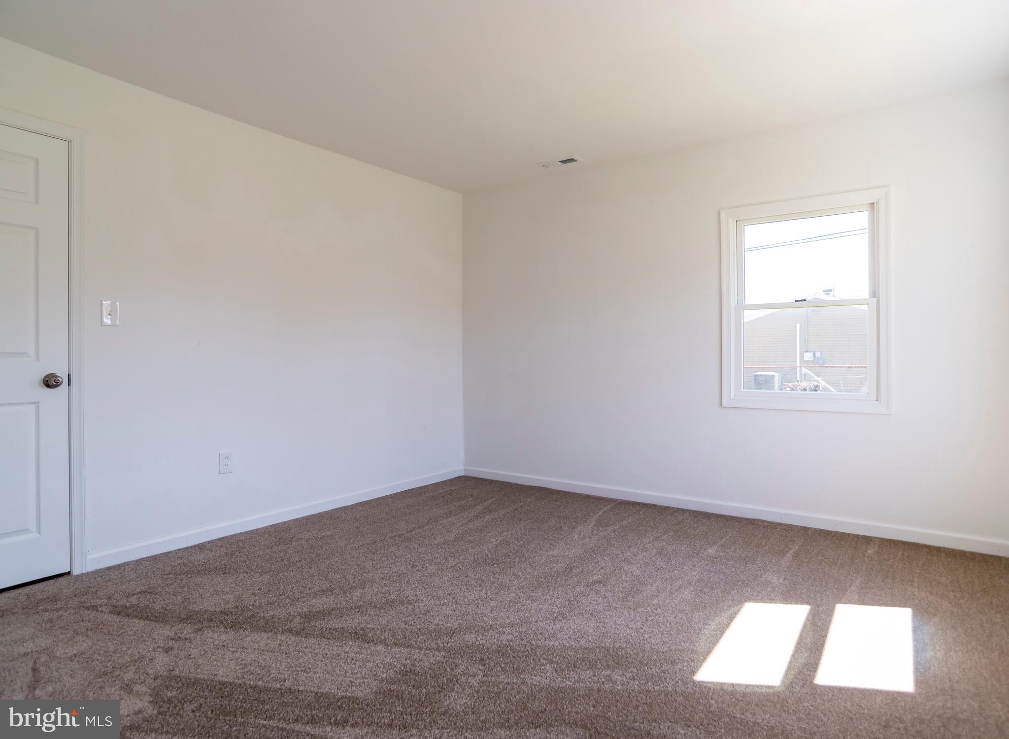 44 Elm Lane Levittown, PA 19054 - Photo 21 of 35 an empty room with a window