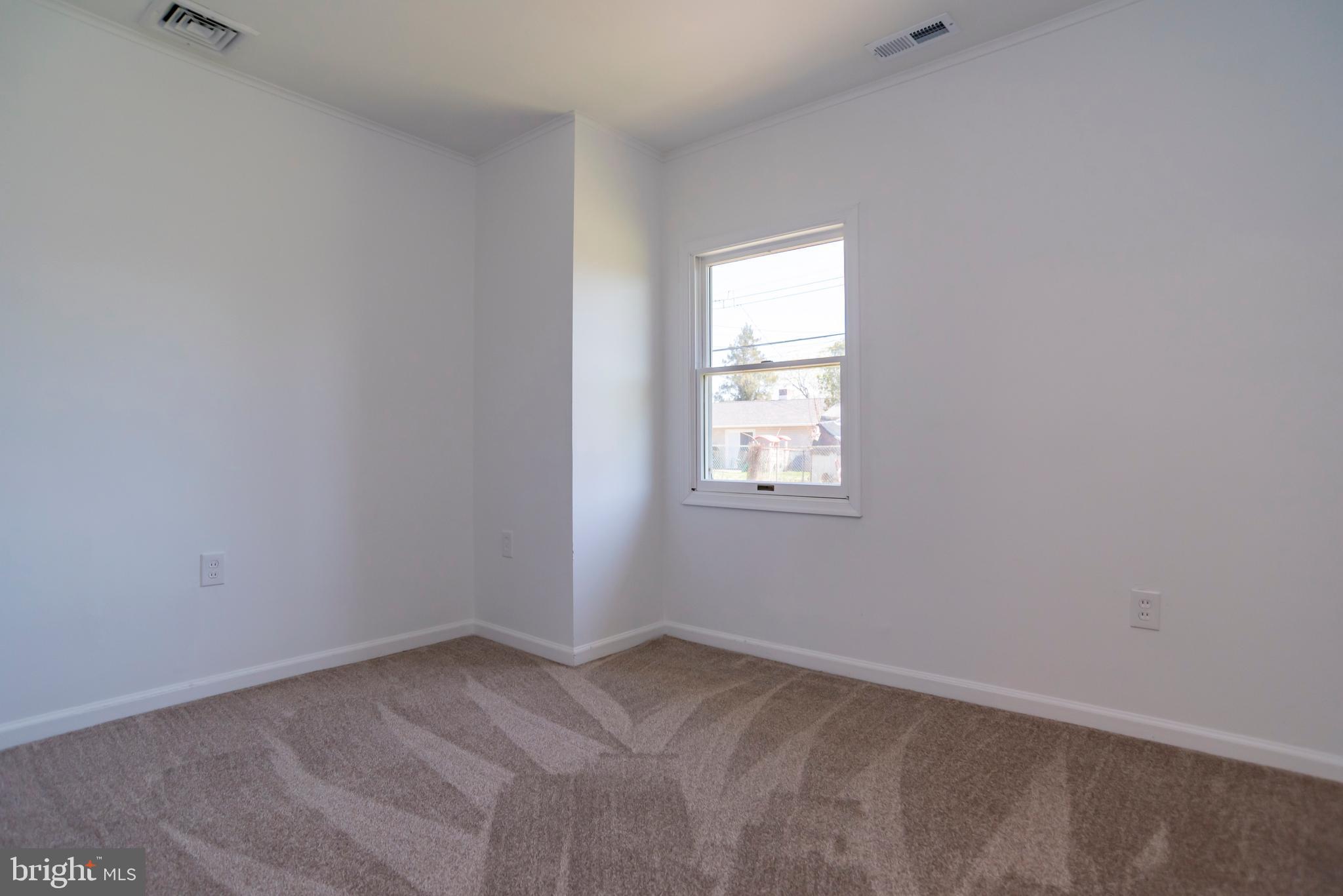 44 Elm Lane Levittown, PA 19054 - Photo 25 of 35 an empty room with a window