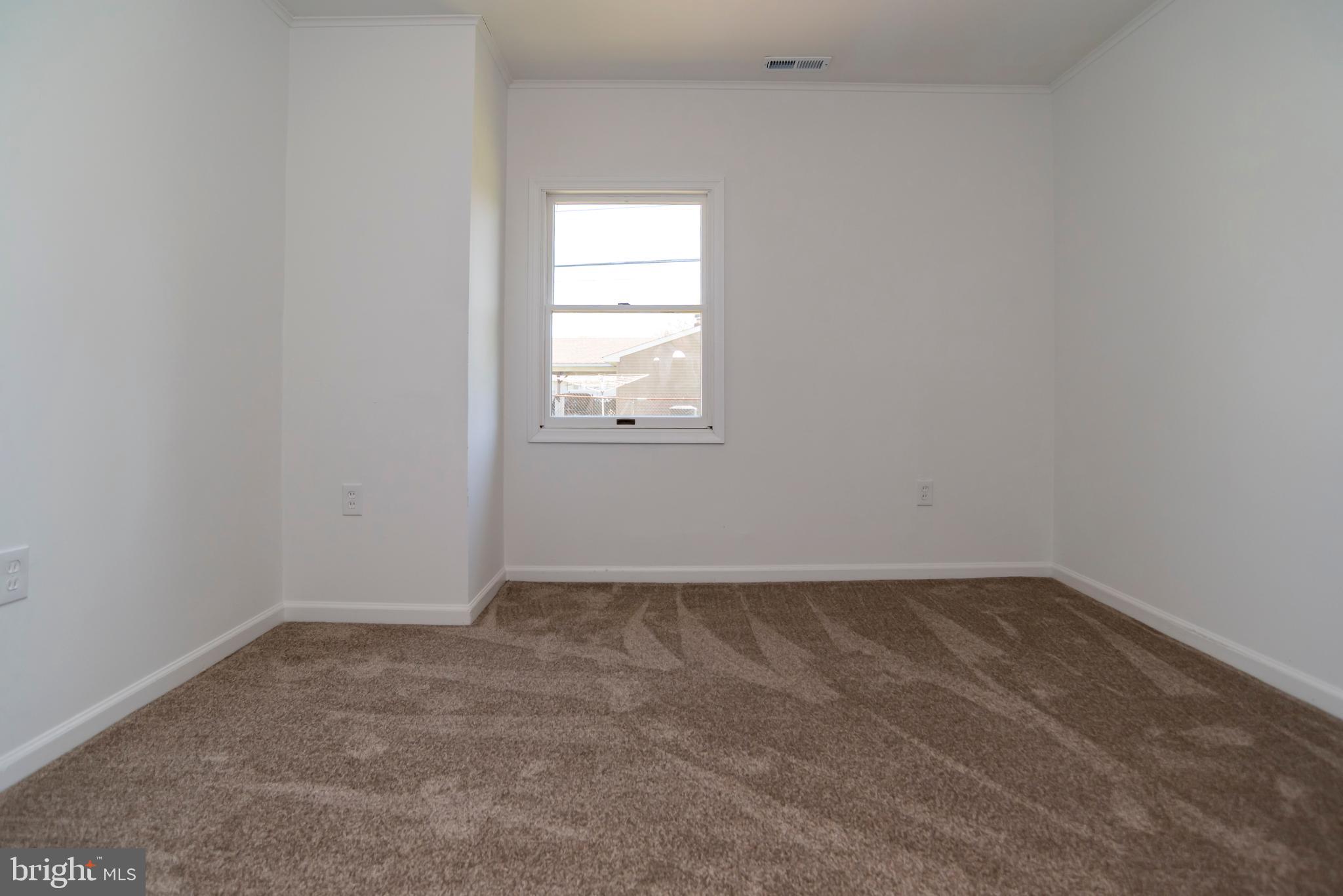 44 Elm Lane Levittown, PA 19054 - Photo 29 of 35 an empty room with a window
