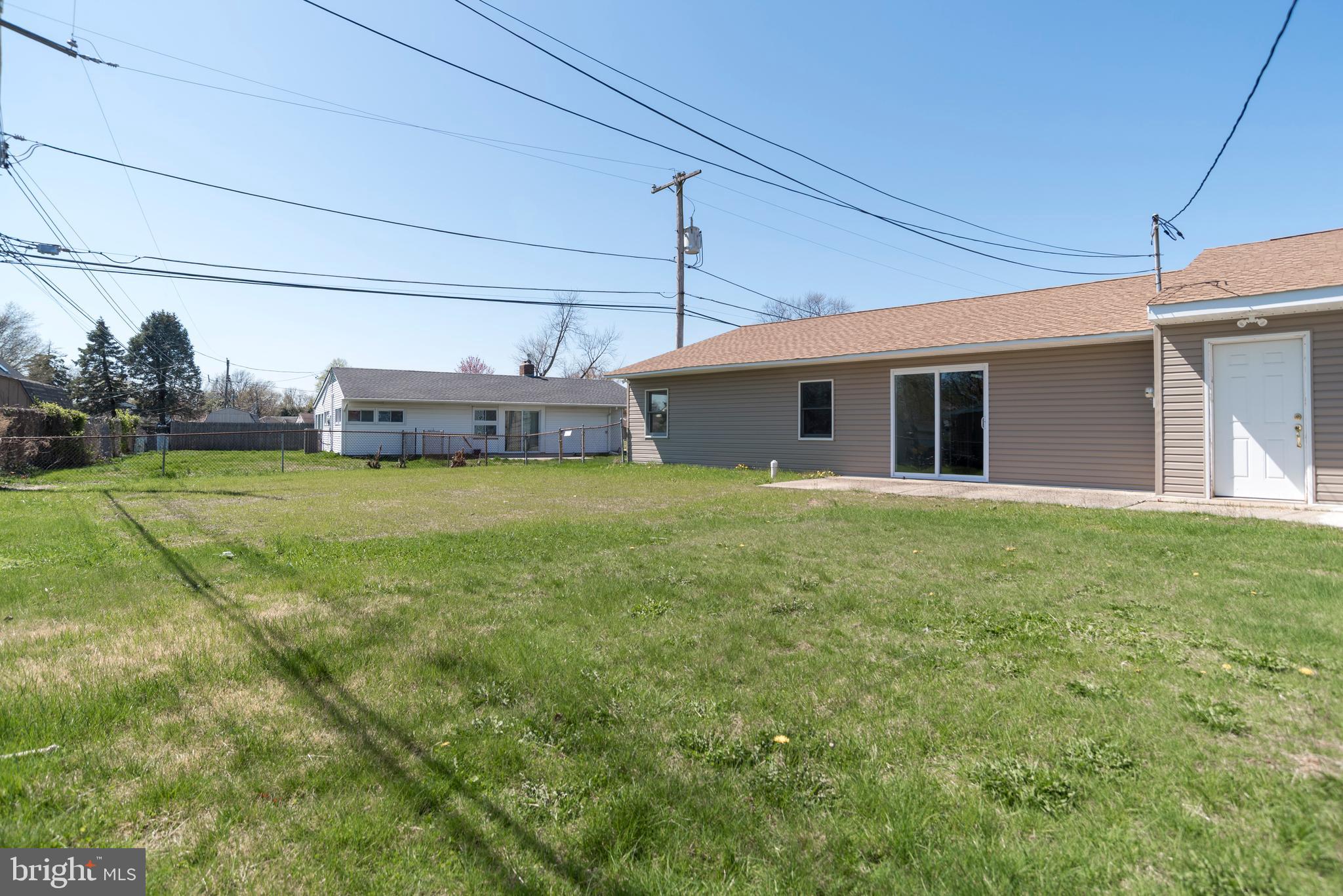 44 Elm Lane Levittown, PA 19054 - Photo 32 of 35 a view of a house with a yard and sitting area