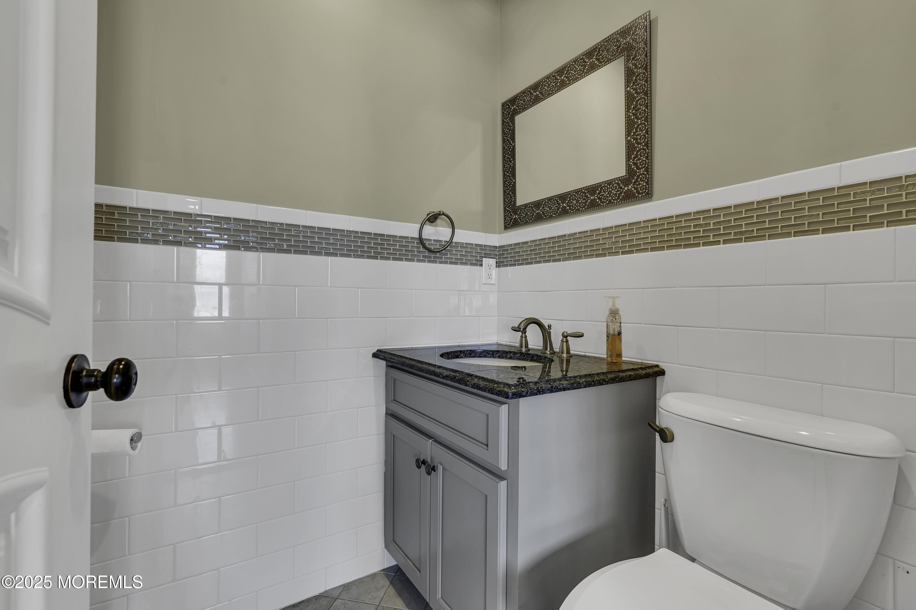 5 Dover Avenue Lavallette, NJ 08735 - Photo 15 of 21 a bathroom with a granite countertop sink a toilet and mirror