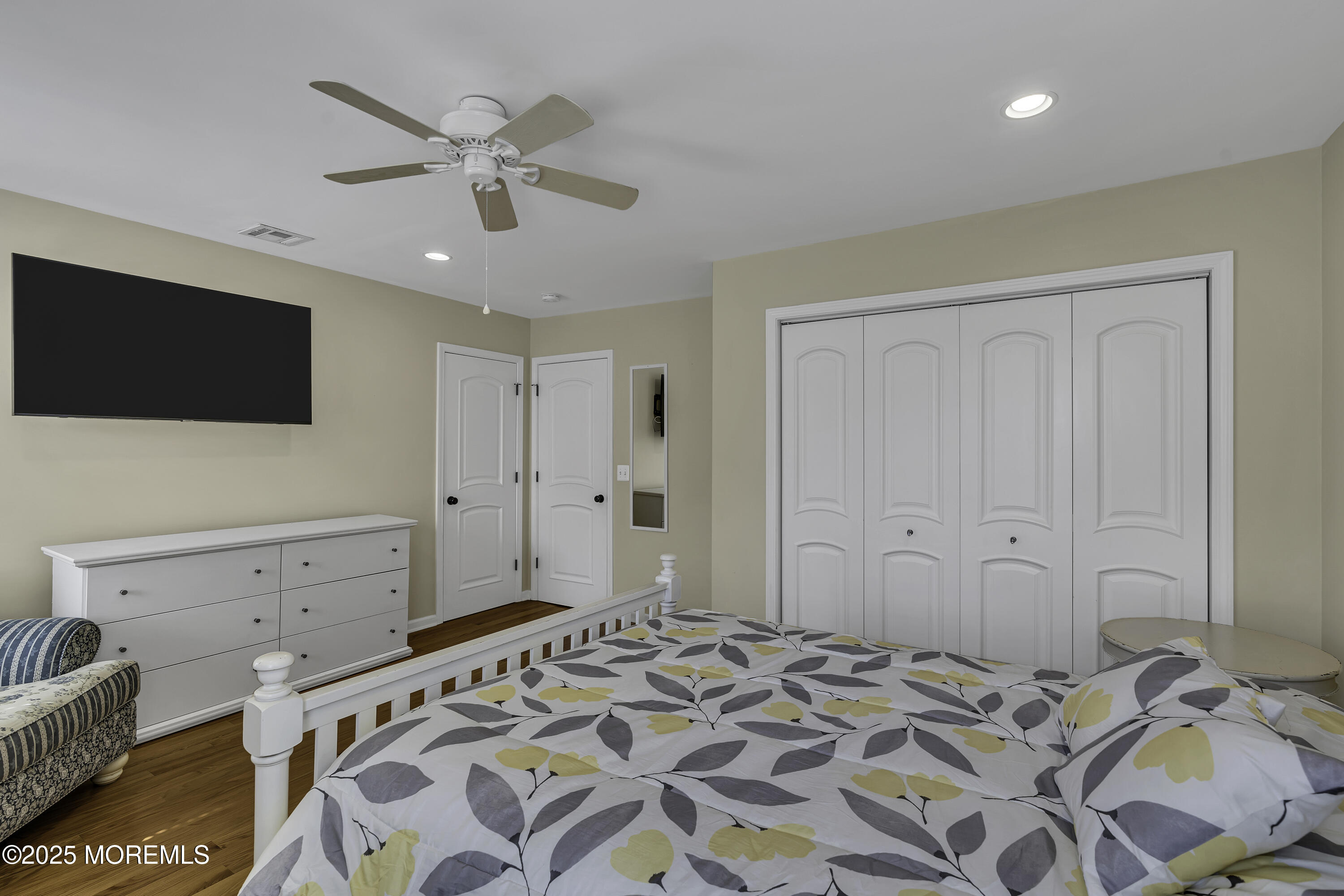 5 Dover Avenue Lavallette, NJ 08735 - Photo 17 of 21 a bedroom with a bed and a flat screen tv