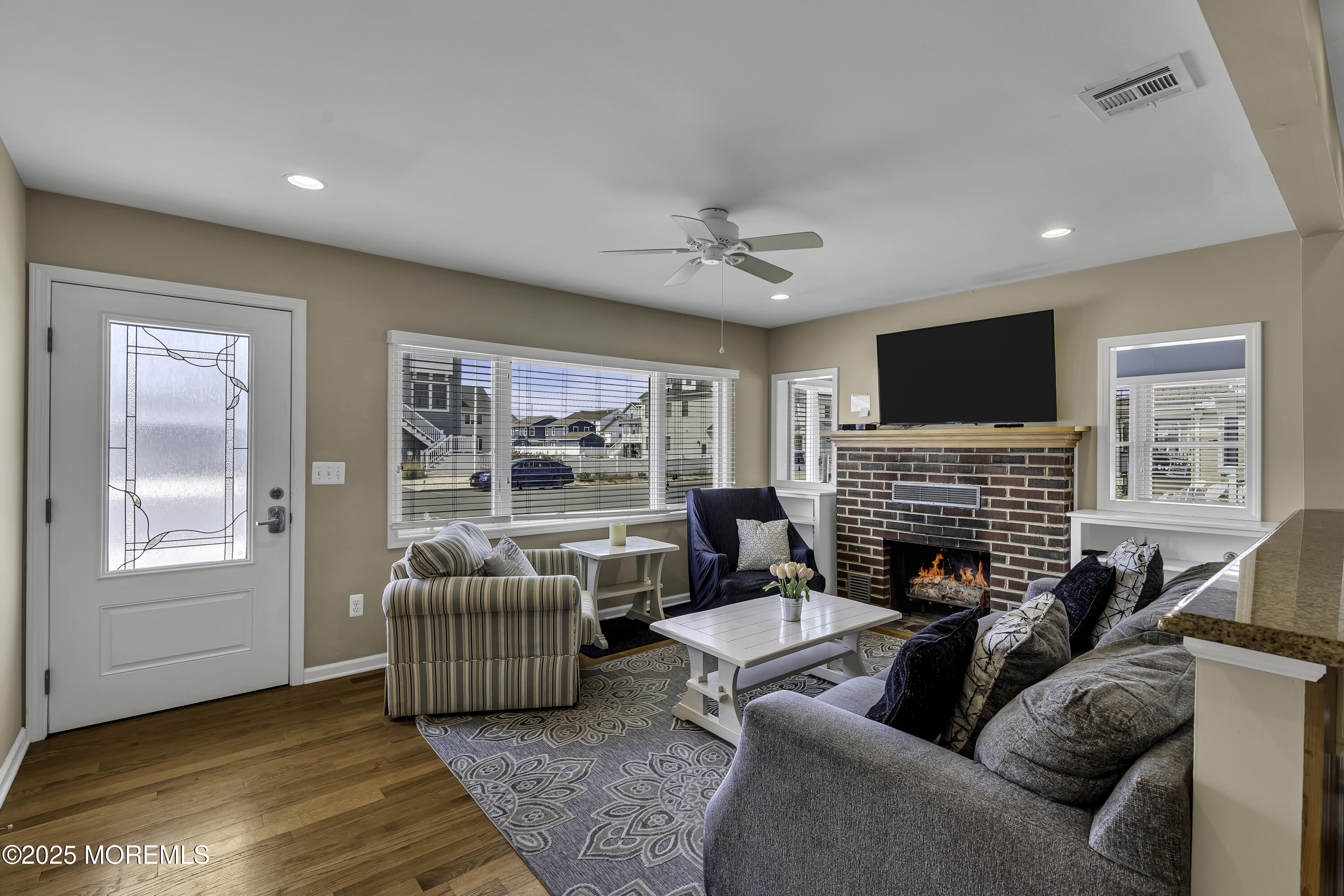 5 Dover Avenue Lavallette, NJ 08735 - Photo 5 of 21 a living room with furniture flower pot and a fireplace