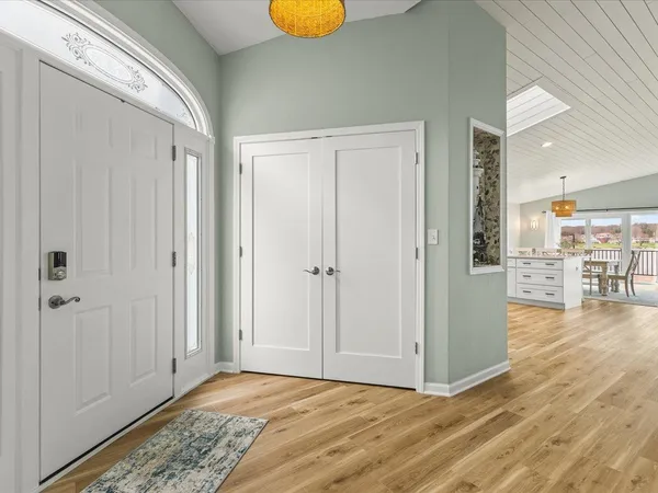 a bedroom with a bed and a table