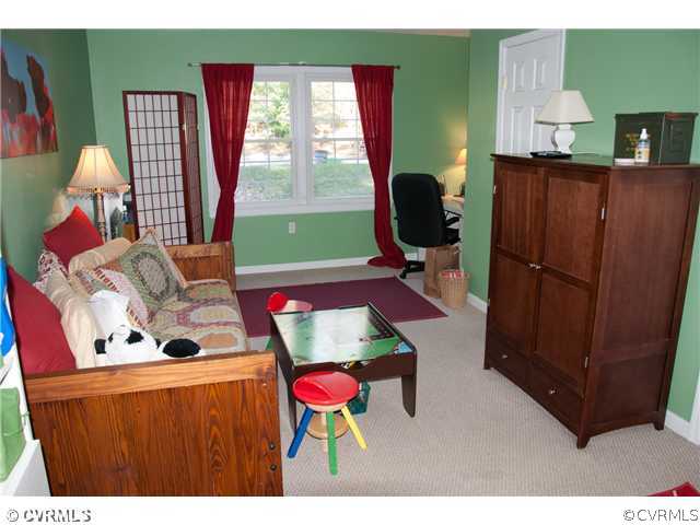 10409 White Rabbit Road North Chesterfield, VA 23235 - Photo 16 of 23 a living room with furniture and a window