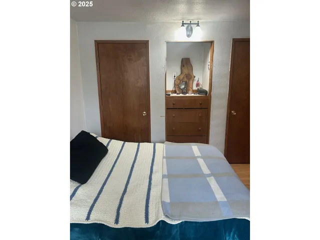 a view of a hallway with front door