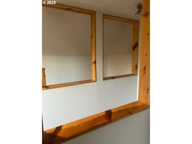 a living room with furniture and window