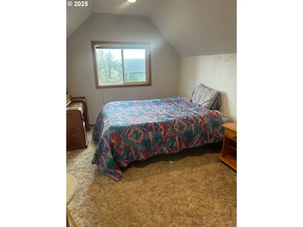 a room with furniture and window