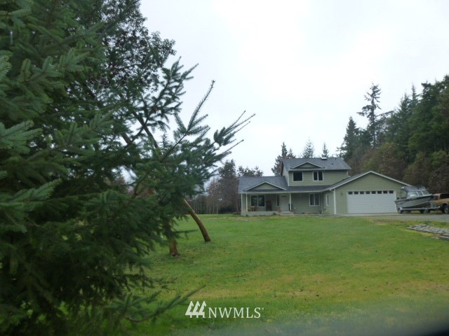 556 Gasman Road Port Angeles, WA 98362 - Photo 11 of 19 a view of house with a yard