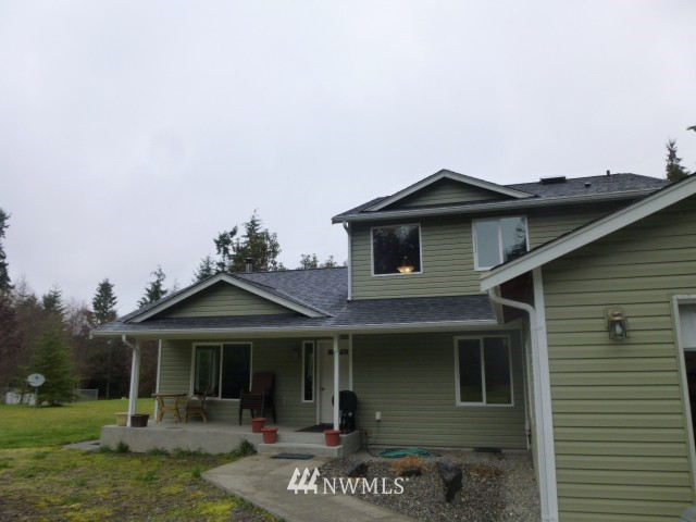 556 Gasman Road Port Angeles, WA 98362 - Photo 18 of 19 a front view of a house with a yard