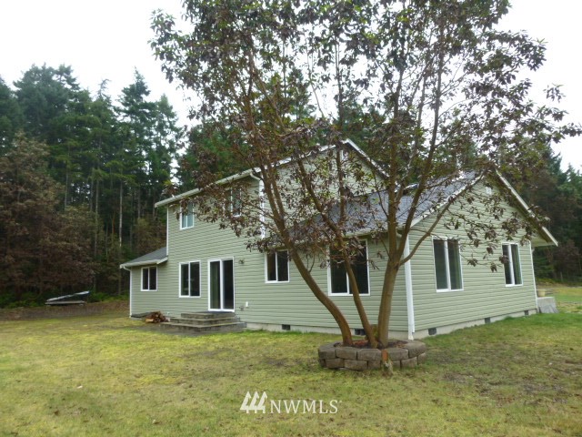 556 Gasman Road Port Angeles, WA 98362 - Photo 19 of 19 a view of a house with a yard