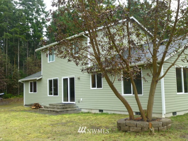 556 Gasman Road Port Angeles, WA 98362 - Photo 2 of 19 a view of a house with a yard