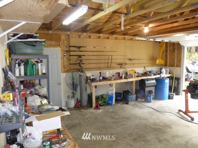 556 Gasman Road Port Angeles, WA 98362 - Photo 10 of 19 a view of a storage room with a lot of stuff