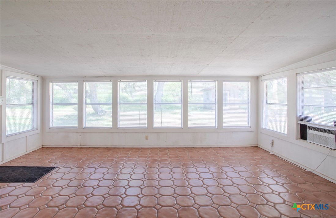 188 Cavalry Road Victoria, TX 77905 - Photo 19 of 30 an empty room with windows