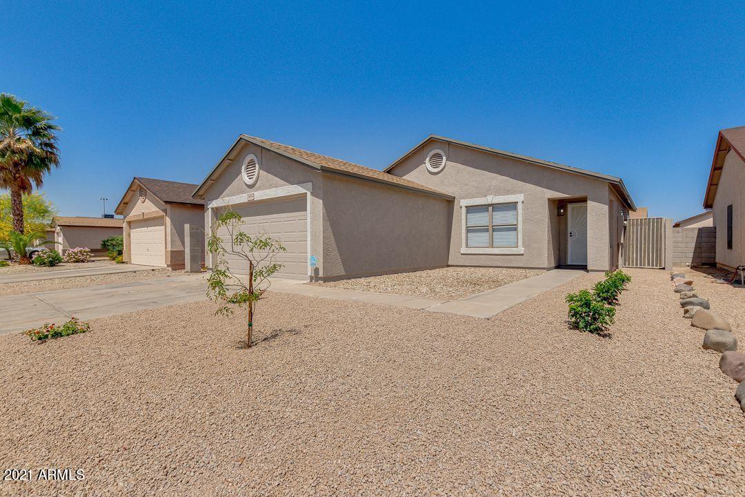 11514 West Larkspur Road El Mirage, AZ 85335 - Photo 1 of 20 a front view of a house with a yard
