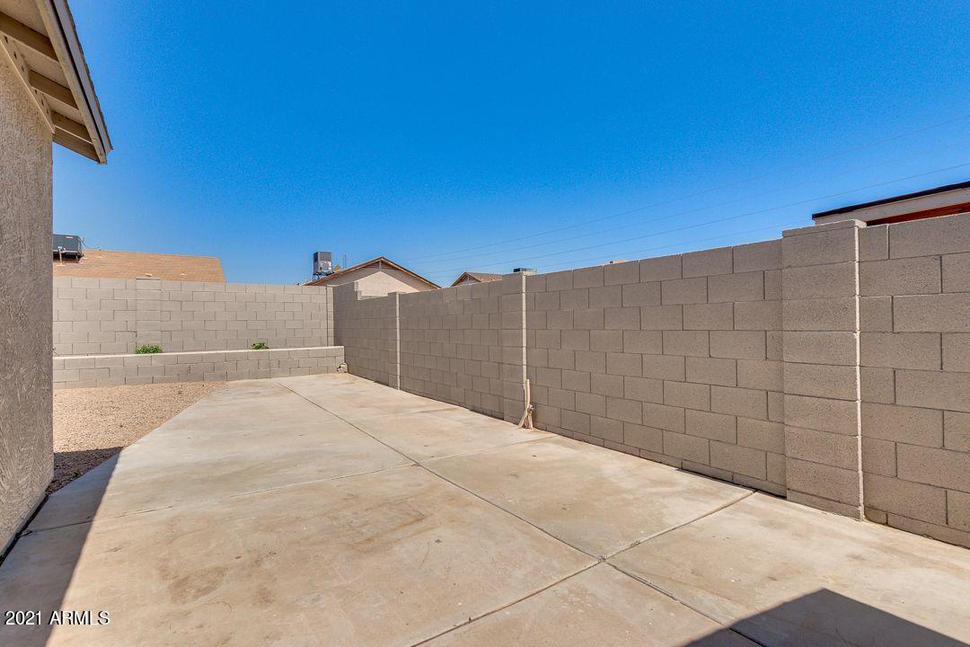 11514 West Larkspur Road El Mirage, AZ 85335 - Photo 19 of 20 a view of a backyard