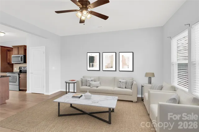 a living room with furniture and a couch