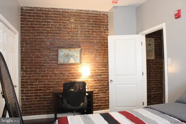 a bathroom with a sink and a shower